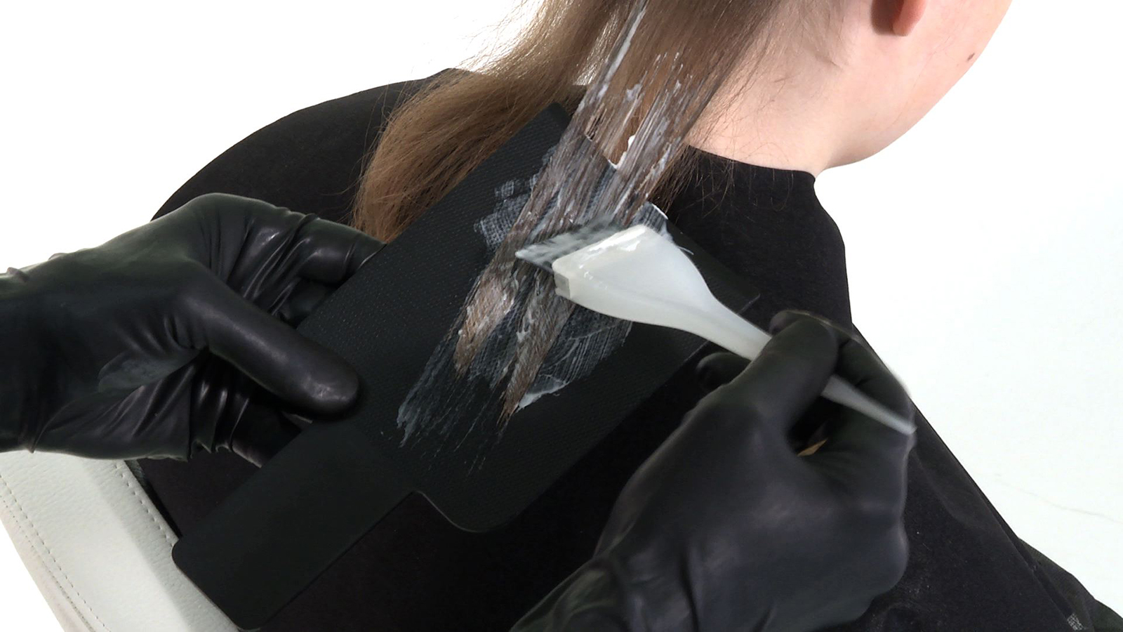 Mastering Balayage Tip 2 - Use a spatula to assist with product saturation between the mid-lengths and ends