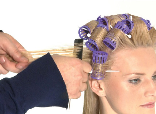 A classic brick wind set provides the bounce, volume and definition of the uber curl trend.